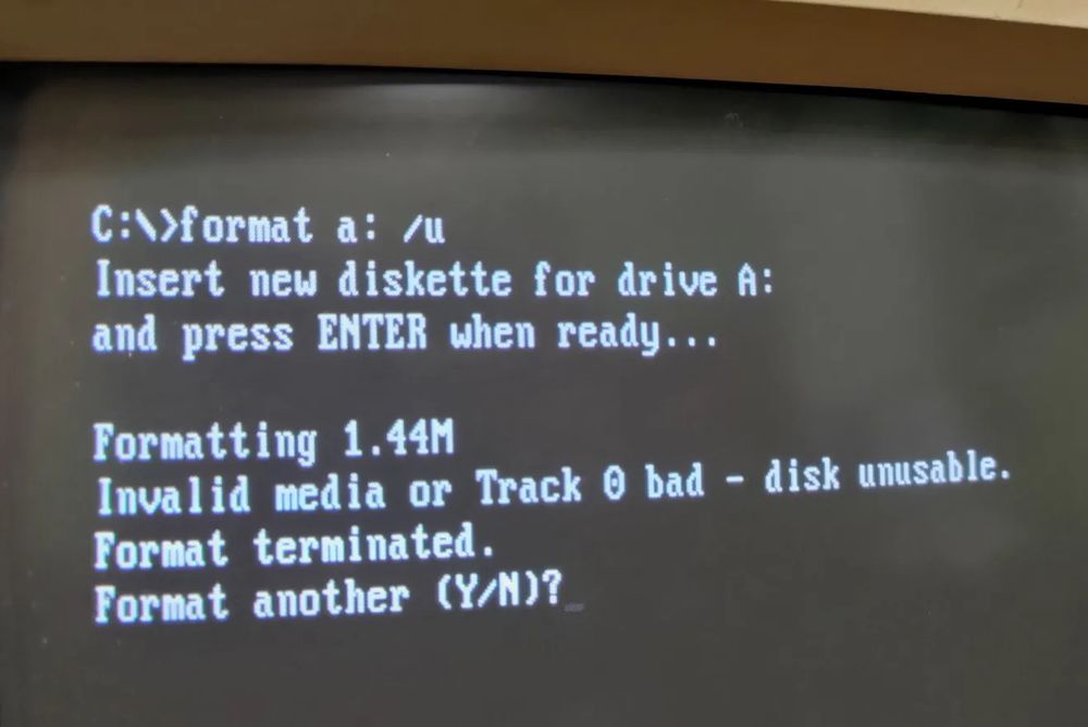 Photo of screen showing DOS unconditional floppy disk format command, that failed due to "invalid media or track 0 bad"