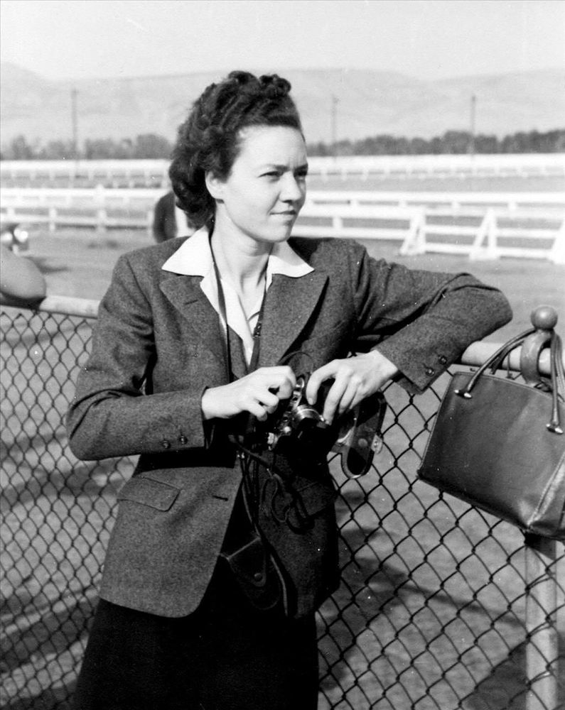 Marjorie Duryee (1913-1991) with camera at unknown raceway