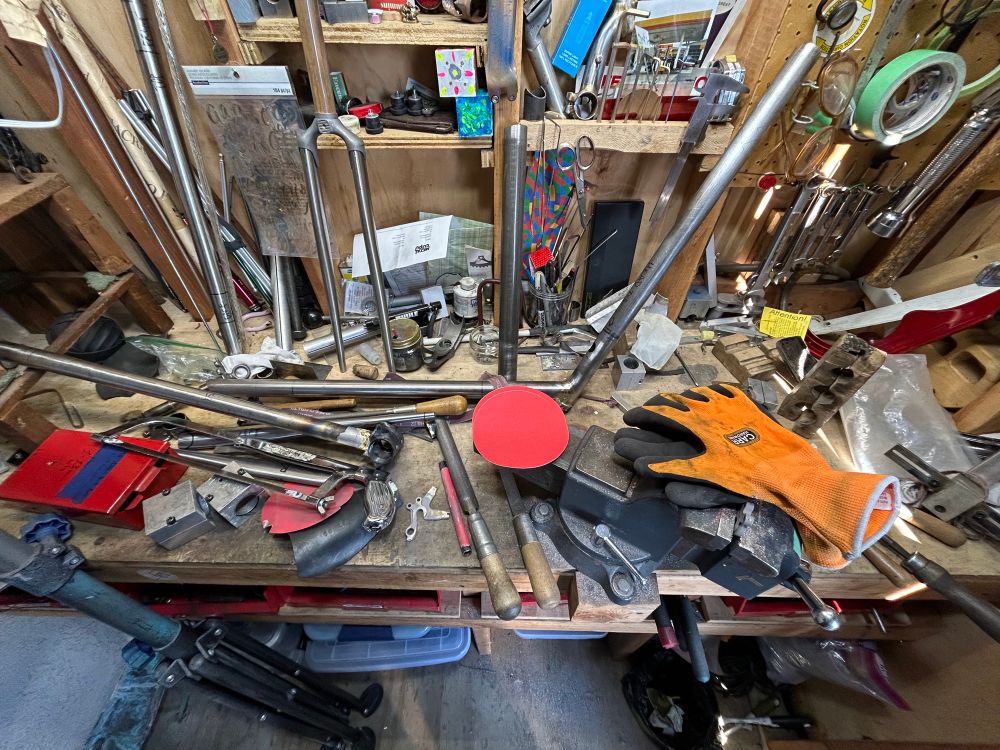 A cluttered workbench 