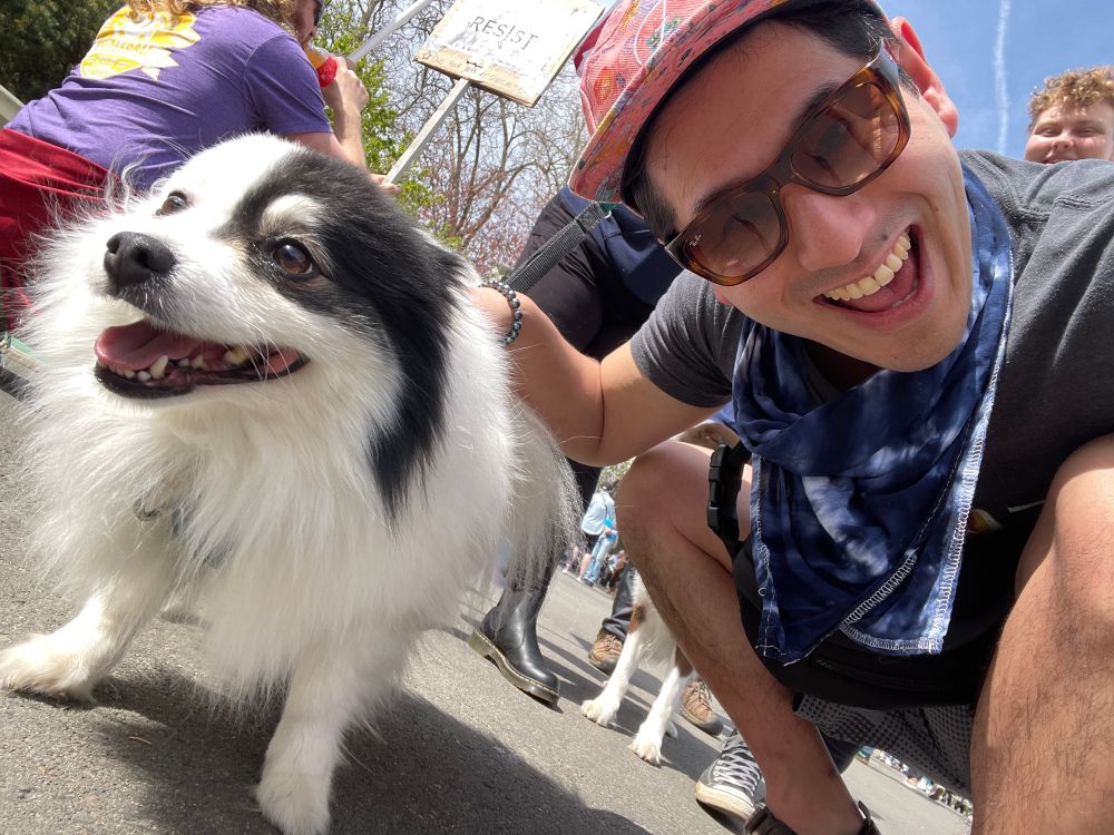 Alex with a protesting dog
