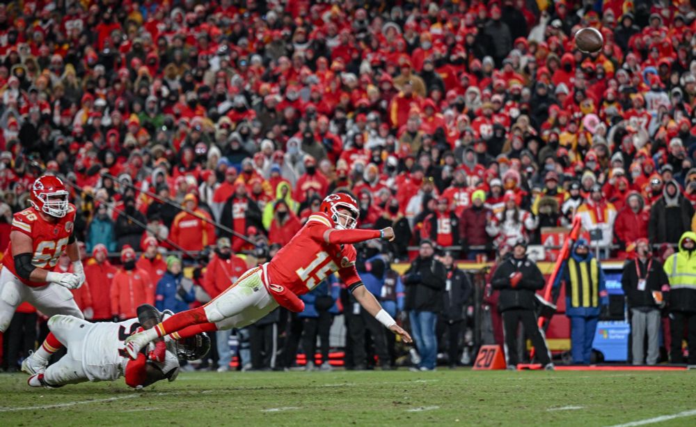 patrick mahomes passing the ball (resulting in a td) while falling to the ground in the divisional playoff game against houston