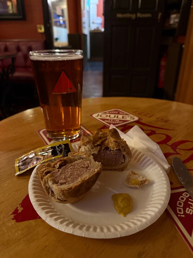 A pint of bass and a pork pie with English mustard at The Coopers Tavern