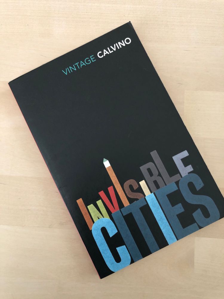 Paperback of Calvinos Invisible cities on a table too