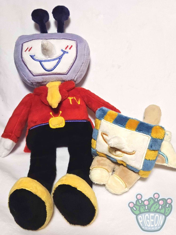 Photo of handmade plush dolls of Tenna and Sphinx Tenna from Deltarune.