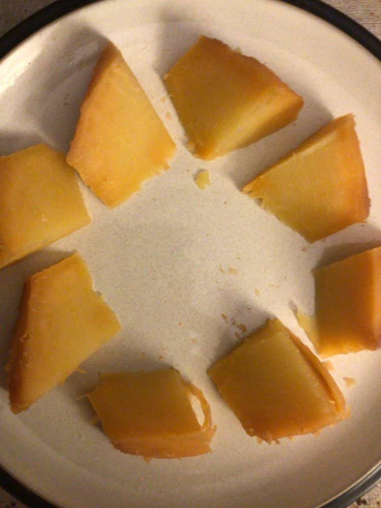 A medium rutabaga cut into eighths on a dinner plate