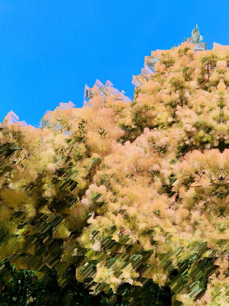 Glitches image of a bush against blue sky