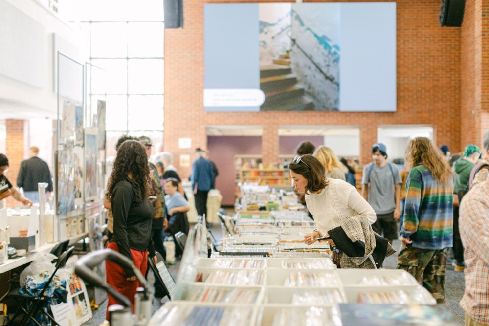 Dead Media Day attendees browsing the many kinds of old media available for sale