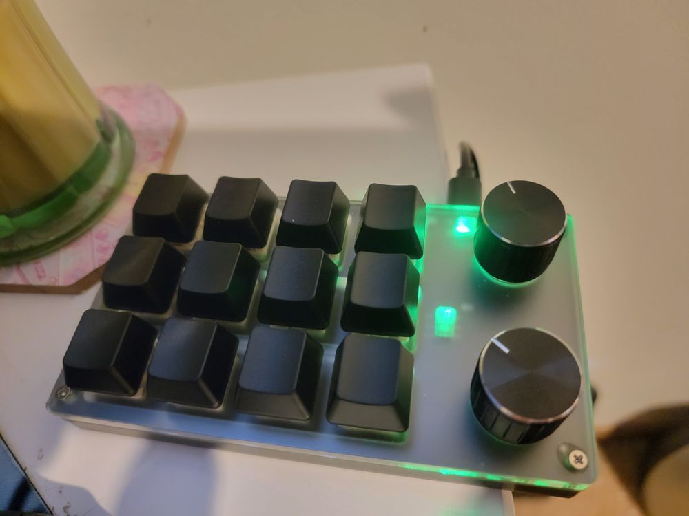 A 3x4, 2 knob macropad with elegant blank black keys
