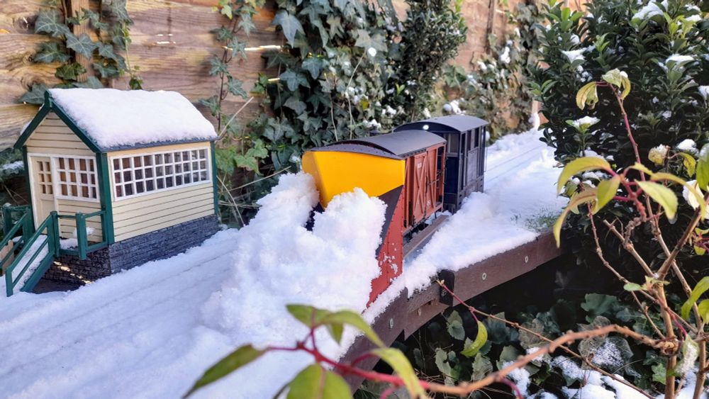 Tram loco and snowplough at work