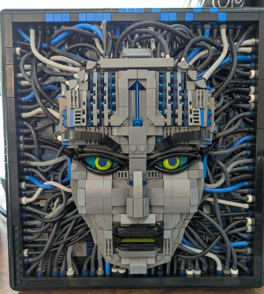 LEGO SHODAN created by Redditor realestateagent0 and shared to the r/lego subreddit, with the image showing SHODAN's face made entirely out of LEGO bricks
