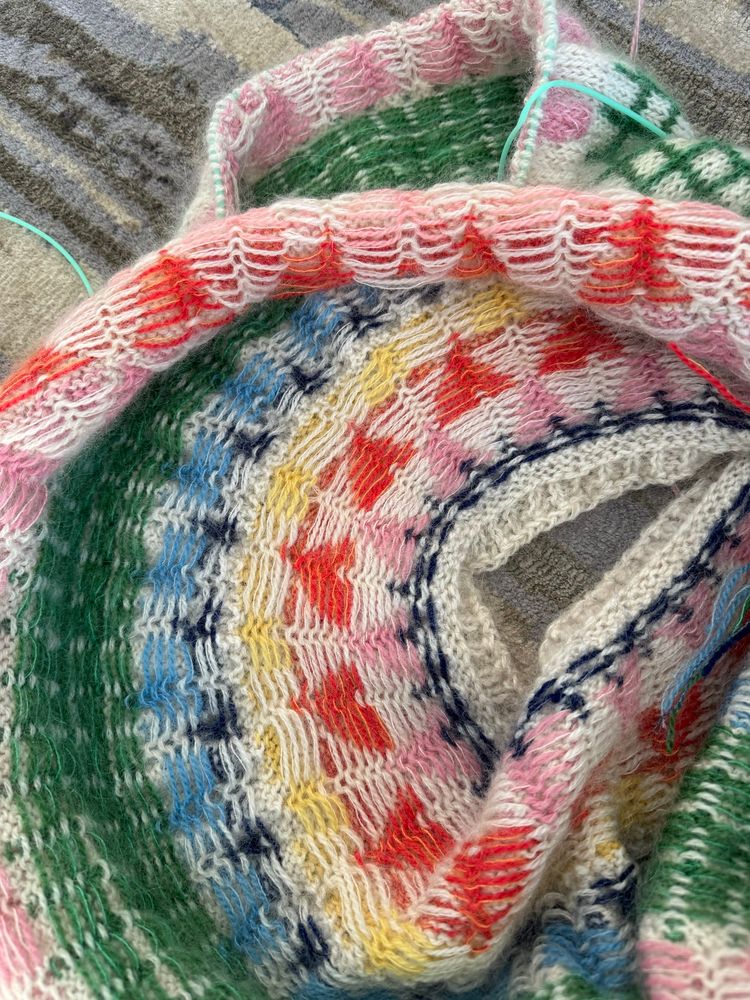 Photo of the inside of the Djo stranded colourwork sweater’s ladderback jacquard stitches.