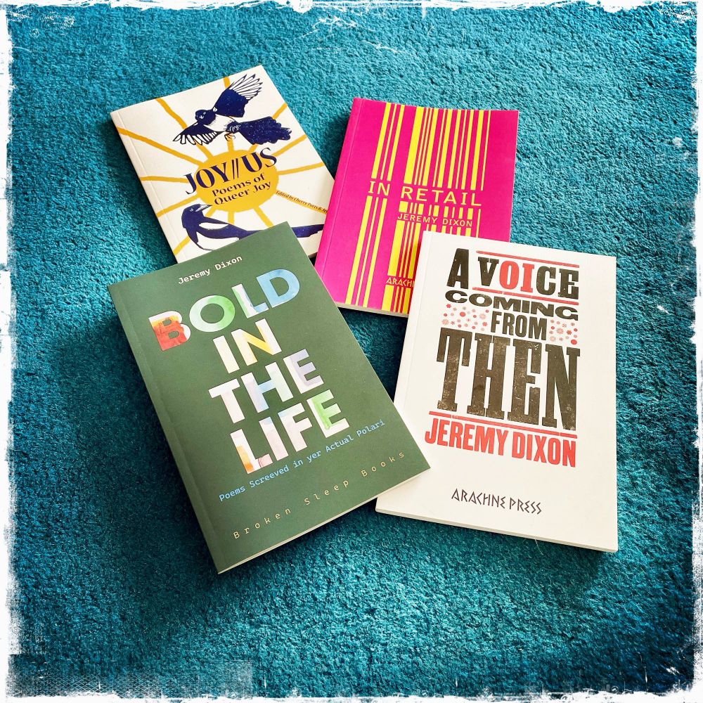 Photo of all four books grouped together.