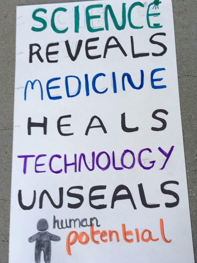 Hand-drawn poster from 2017: "Science Reveals, Medicine Heals, Technology Unseals Human Potential". Credit: M.B.G.
