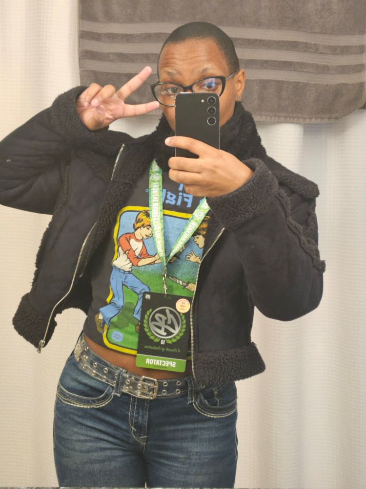Me, in one of my favorite outfits taking a mirror picture in a hotel bathroom
