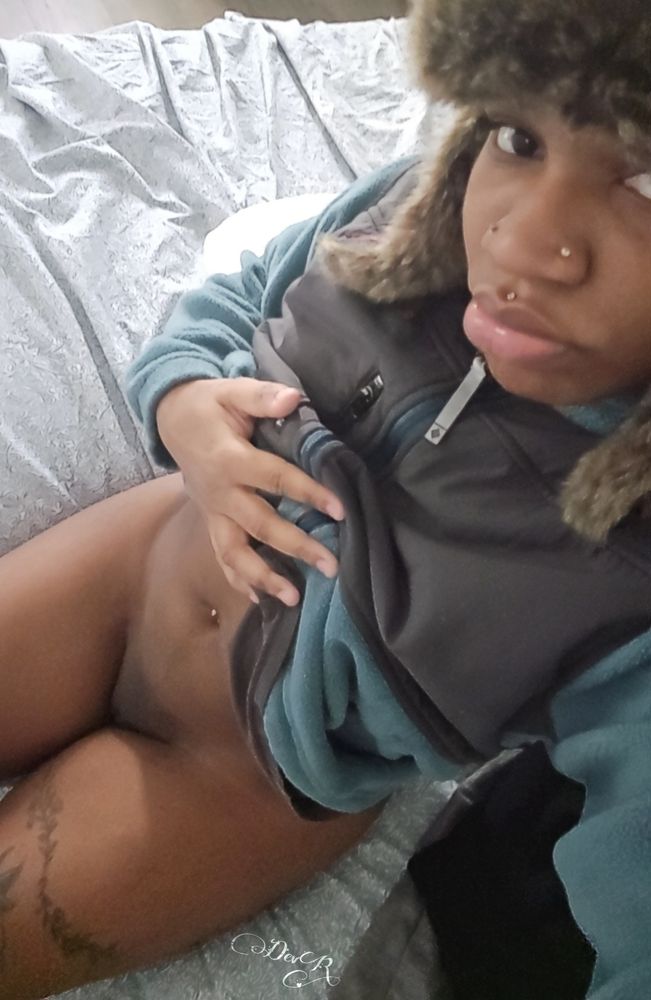 Devon sitting in his freezing cold bedroom. Wearing a hat, jacket, and no pants :)