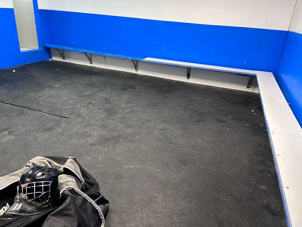 A view from my corner of the dressing room: my bag is in the foreground; the rest of the room is empty