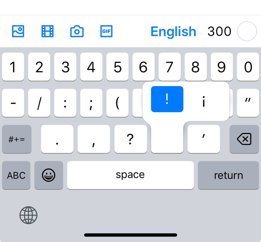 iOS keyboard showing long press of exclamation mark key