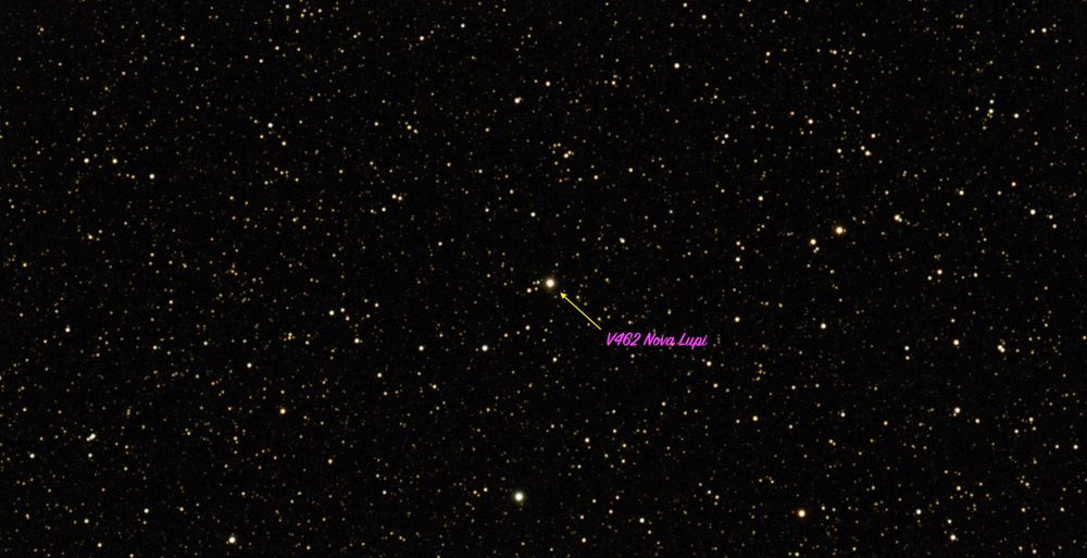 Starry sky with a brighter star in the center labeled as V462 Nova Lupi.