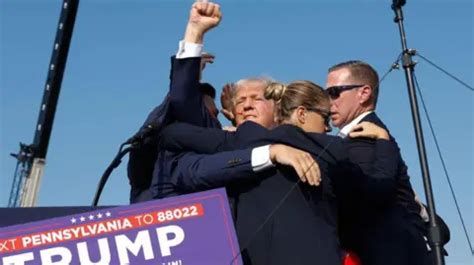 Image shows the carefully staged photo of Trump partially surrounded by SS agents in Pennsylvania at a rally after his alleged "assassination attempt", fist raised, a Trump campaign card in frame with the number to text donations to.

https://www.bbc.com/news/articles/cvglm0rjy2go

How social media assassination conspiracies are uniting pro- and anti-Trump voters
22 September 2024

Marianna Spring -- Disinformation and social media correspondent