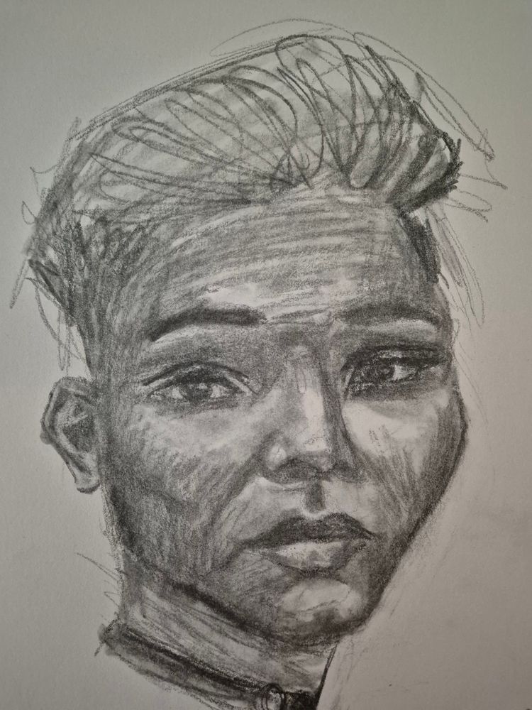Graphite sketch of a young queer person with head tilted slightly to their right. 