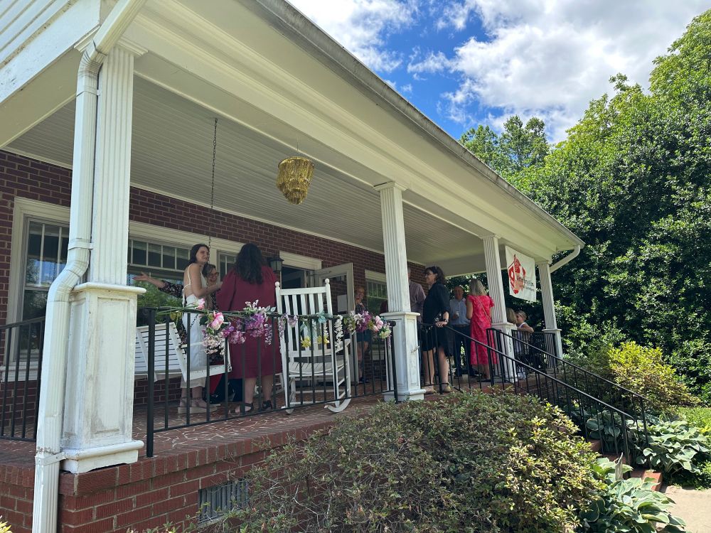 View of people socializing on a porch