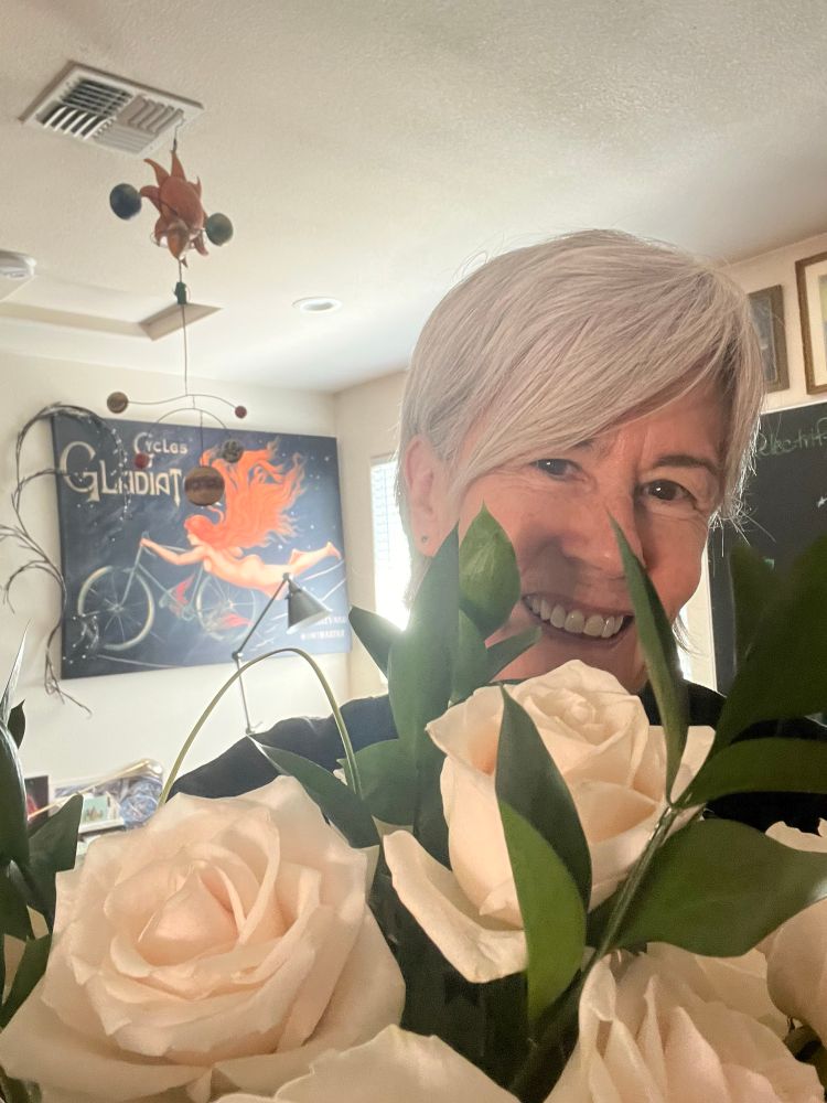 Author with roses. New release celebration. 