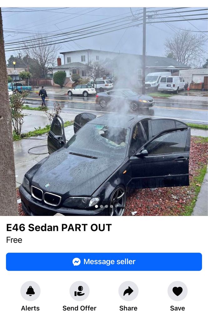 a facebook marketplace ad reading "E46 Sedan PART OUT Free"
the picture in the ad is a black BMW sedan with major visible damage to the driver side windshield; like comical damage, the big hole in the windshield has smoke coming out of it. All the doors are open.
in the background, a rainy suburb where someone is casually walking past and paying no mind.