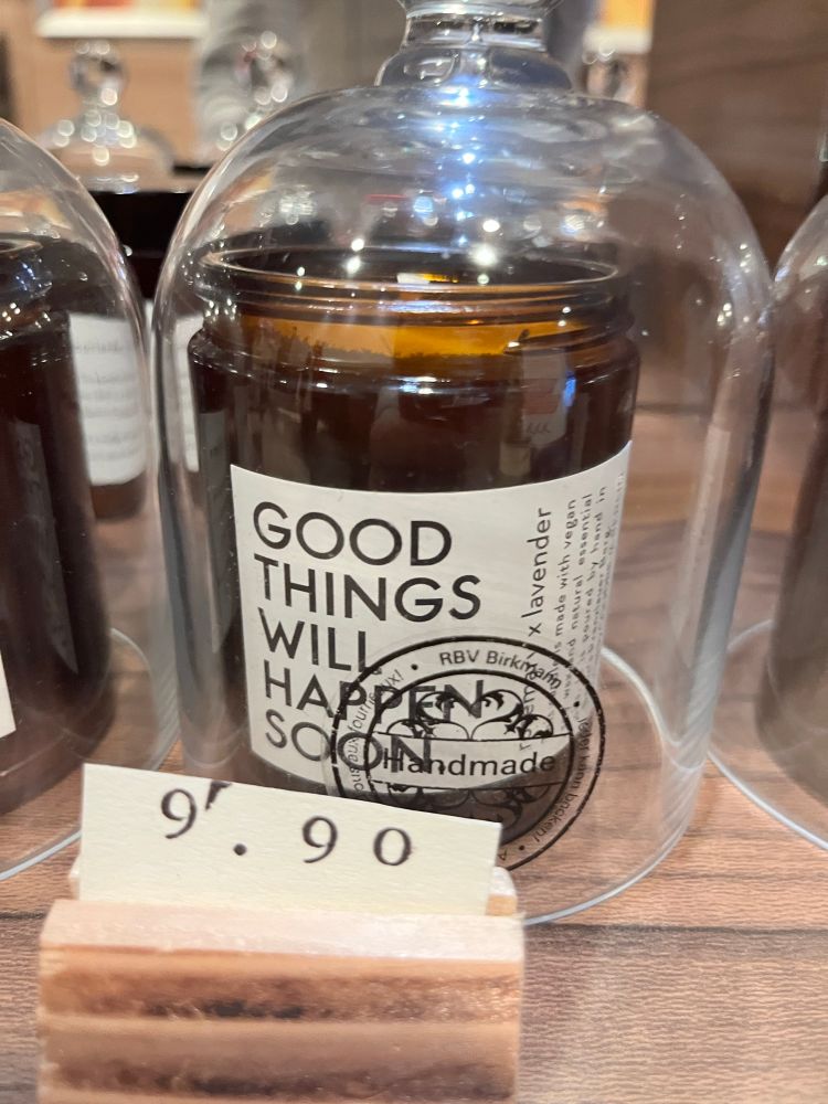 A glass with the label “Good things will happen soon” and a price tag of 9,90.