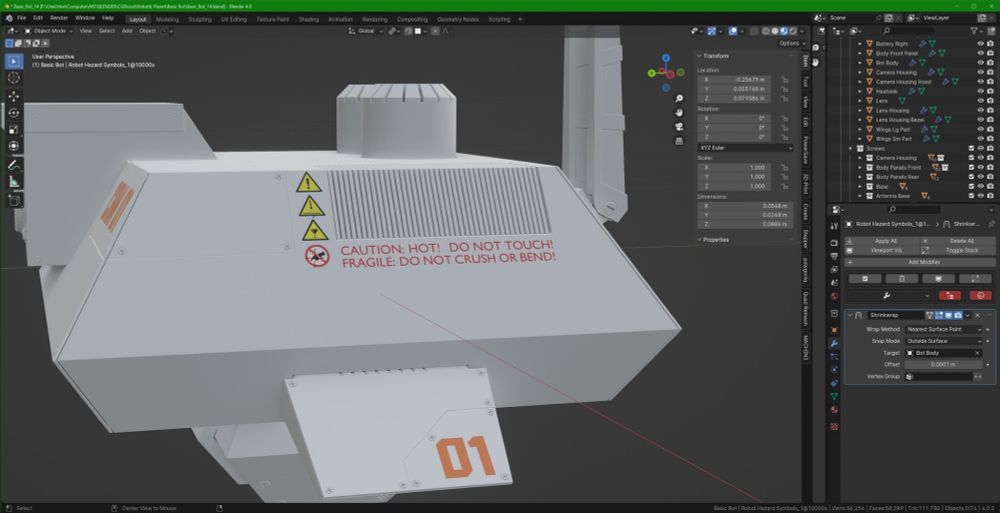 A screenshot of the Blender workspace showing a side view of decals on the "basic bot" camera bot from CG Boosts Robotic Planet course by Louis du Mont.
