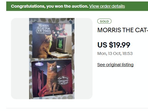 an ebay screenshot saying "congratulations, you won the auction" showing a Morris the Cat calendar from 1986