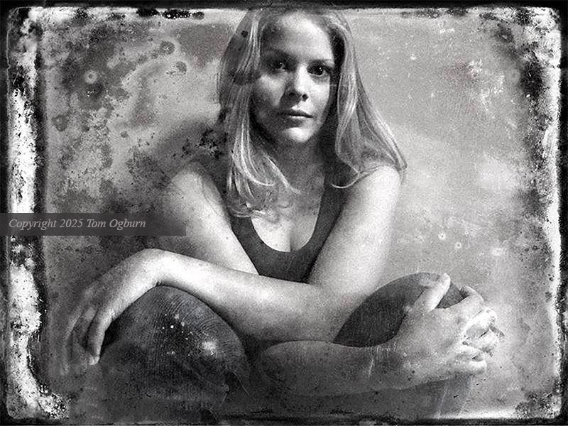 'Betzere,' from the 'Studio Beaufain' series of portraits of the models and muses who worked with me for 10 years in Charleston, South Carolina. This was shot in the sunroom of my Beaufain Street studio, up on the third floor, a wall of old Craftsman windows on three sides, with Colonial Lake just below. The light in the sunroom was incredible!

The image is of a woman seated cross-legged, her arms crossed, almost entwined around her knees.

This photograph was made with a little Canon A5 camera, one of the first digital cameras dating from 1995. I still have it, and plan to do a separate tier of photographs using it for "The Parkways Projects" on Patreon. 

It's up on Bluesky now @parkwaysprojects — by all means check it out! The core of the series is about the Blue Ridge Parkway and the Skyline Drive Parkways, Great Smoky Mountains and Shenandoah National Parks. There's many different layers to it, from the beginnings of all four NPS parks, its people, the Civilian Conservation Corps, the young men who built many of the classic timber-frame construction buildings. There will be many other related subjects, histories, stories and original archival photographs from the Open Parks Network, a collaboration between the National Park Service and Clemson University Library's Archives.