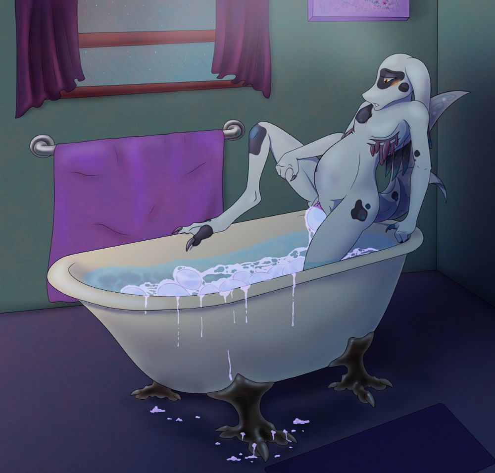 Thea, a fish rabbit hybrid, gingerly getting into a bath tub filled with eggs that she is currently laying. 