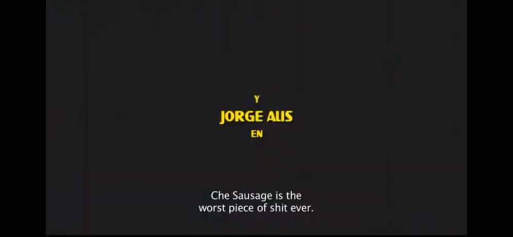 Screenshot showing that Jorge Alis is in the film, plus a subtitle: “Che Sausage is the worst piece of shit ever”