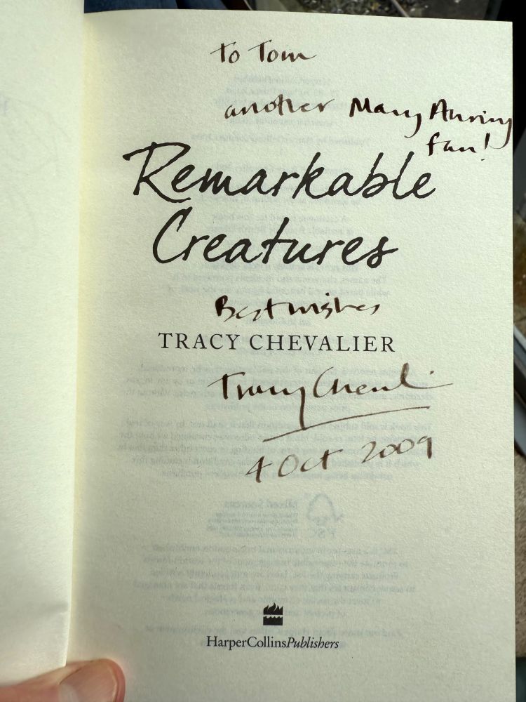 Title page of Remarkable Creatures by Tract Chevalier, signed and dedicated in fossil sepia ink by the author.