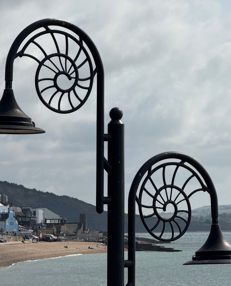 Streetlights designed with an ammonite spiral. 