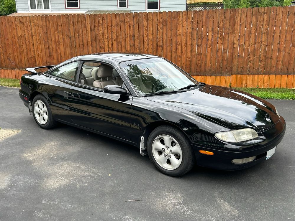 A black Mazda MX6