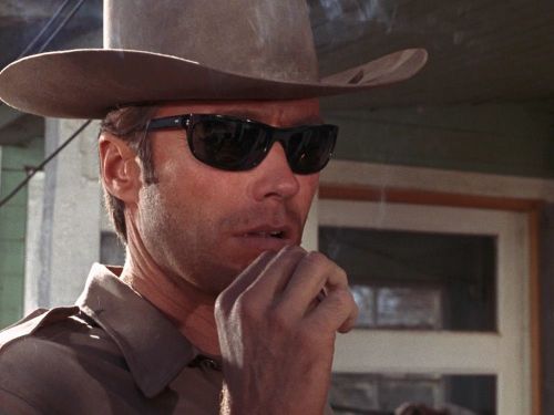 Clint Eastwood in cowboy hat and sunglasses as deputy sheriff Walt Coogan in the 1968 film "Coogan's Bluff."