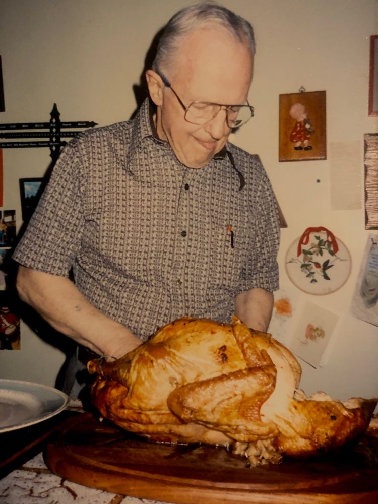 My dad preparing the turkey for Thanksgiving circa 1986