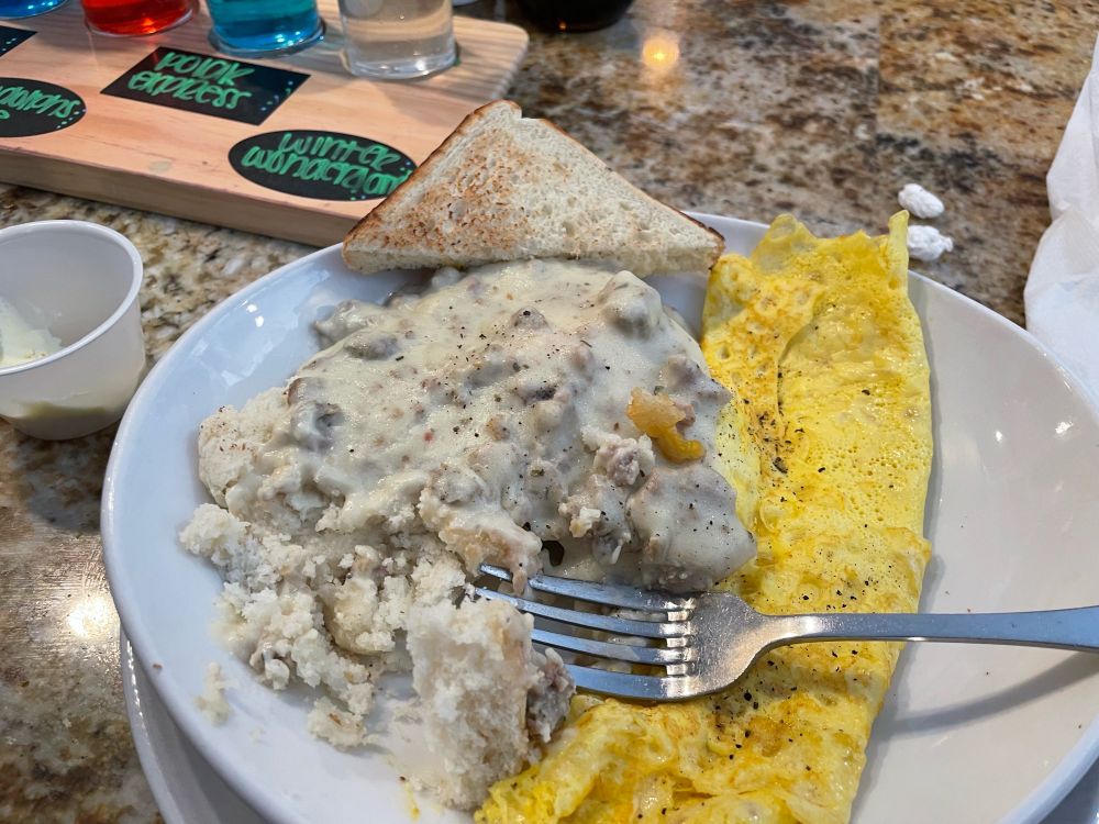 Biscuits and gravy with an egg on the side