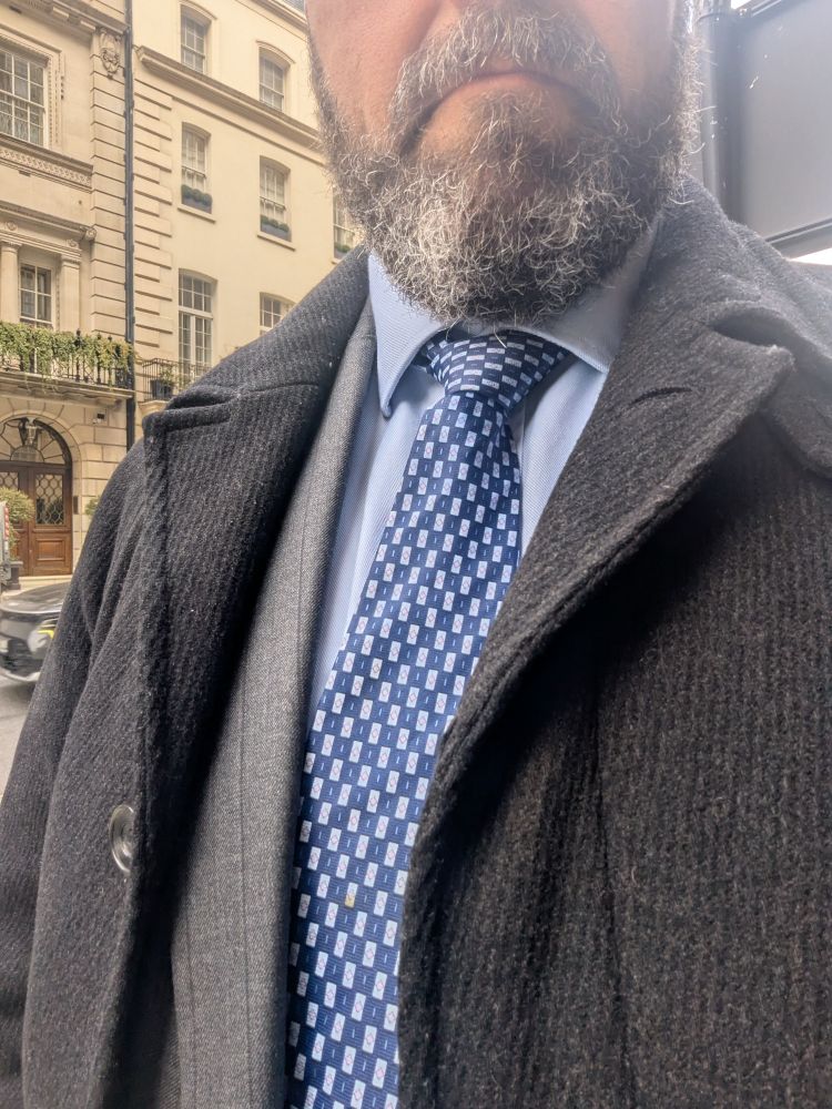 Me wearing a suit and tie.