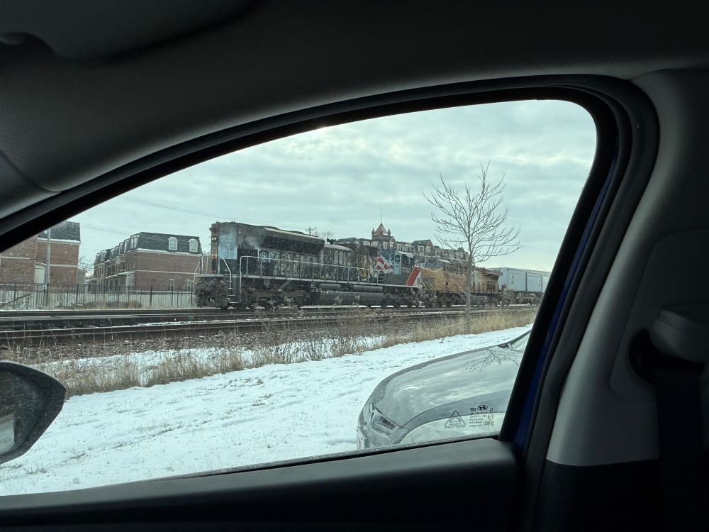 UP #1111 “Employee Pride” as the trailing DPU. 