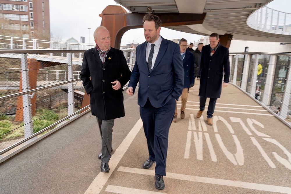 Simon touring the Stockport interchange with local representatives