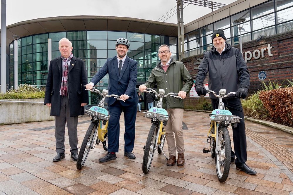 Simon joined by Olympic champion and national integrated transport commissioner Chris Boardman and local officials at Stockport interchange