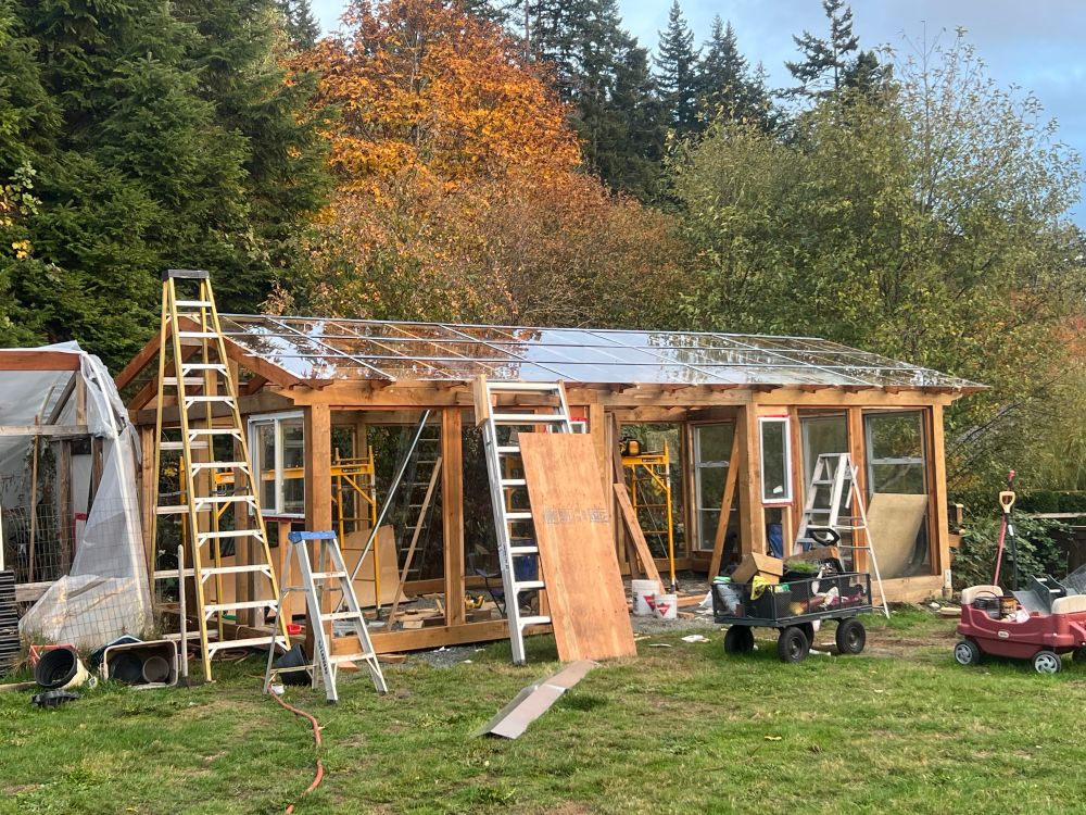 Photo depicts our greenhouse
with all of the roof glass now in place, we are getting closer to completion. Just need the weather to cooperate! 
