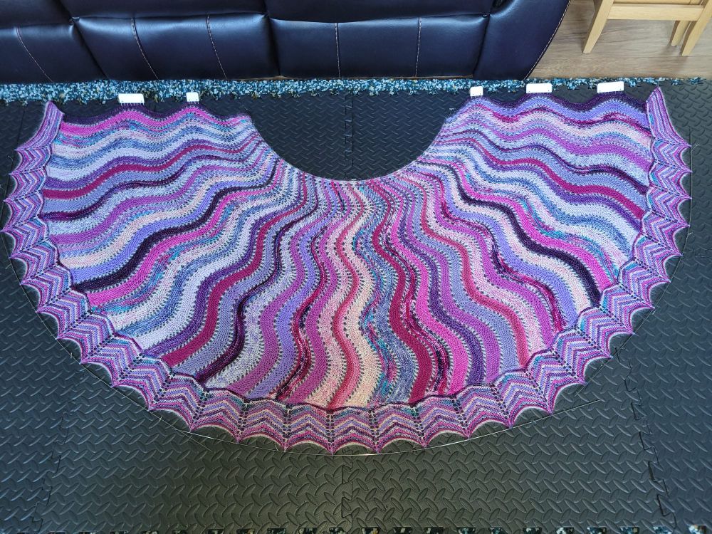 Resplendence Shawl in a multitude of pinks and purples. 