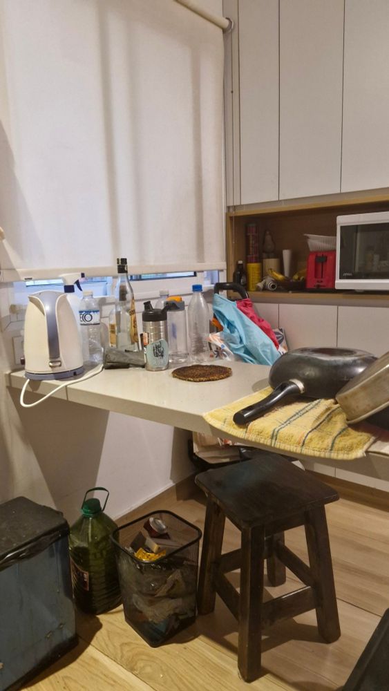 A kitchen interior. Somewhere a cat is hiding.