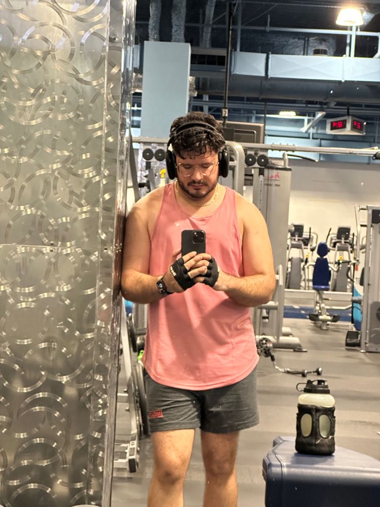 Waiting for a machine to open at the gym. 