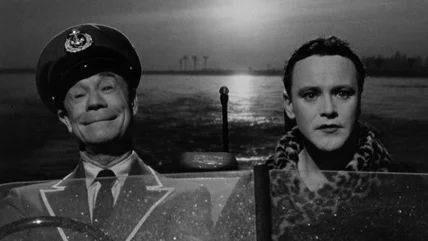 Joe E Brown and Jack Lemmon, side by side in a motor launch, final shot of "Some Like It Hot". "Nobody's Perfect".