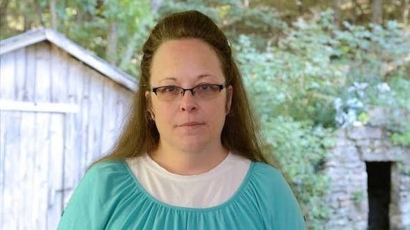 Woman with large forehead 3x divorced suing gay couple for gay marriage.