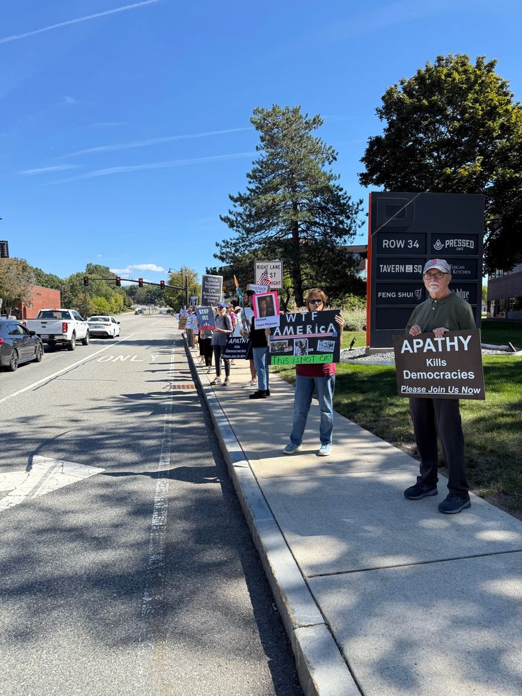 People standing with signs